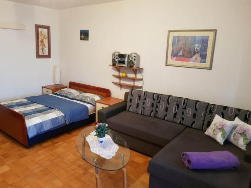 Postel nebo postele na pokoji v ubytování Apartman Ada