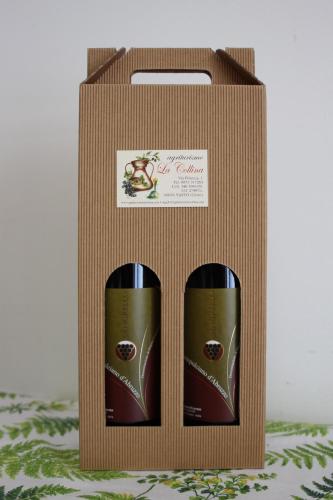 two bottles of wine in a cardboard box at B&B La Collina in Vasto
