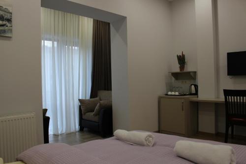 Katil atau katil-katil dalam bilik di Boutique Hotel 32