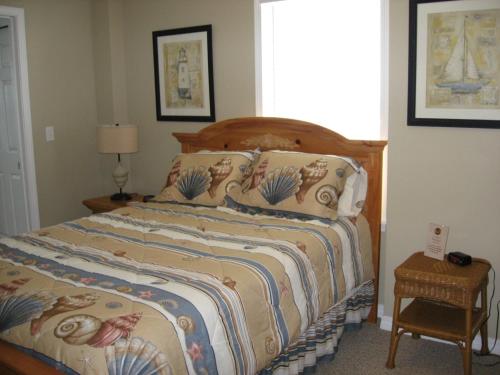 Ένα ή περισσότερα κρεβάτια σε δωμάτιο στο VacayFun Condos - Caribbean