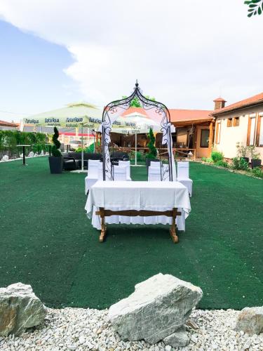 a table set up for a wedding in a field at Sztár Motel Étterem in Balassagyarmat