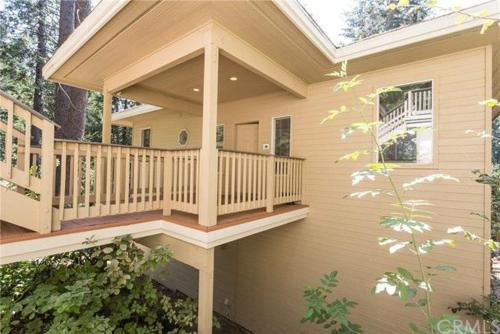 a screened in porch on a house at Pine Arbor Retreat in Yosemite West