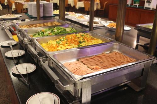 a buffet line with many different types of food at Hotel River Kinmen in Jincheng