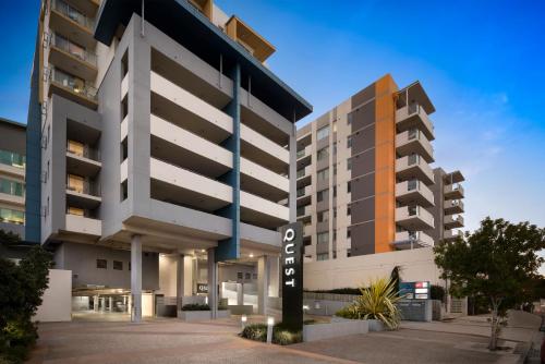 an apartment building with a street sign in front of it at Quest Chermside in Brisbane