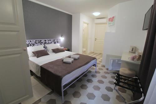Letto o letti in una camera di Noemi's rooms
