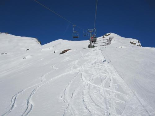 a ski lift on top of a snow covered mountain at Am Zanggerhof in Imst