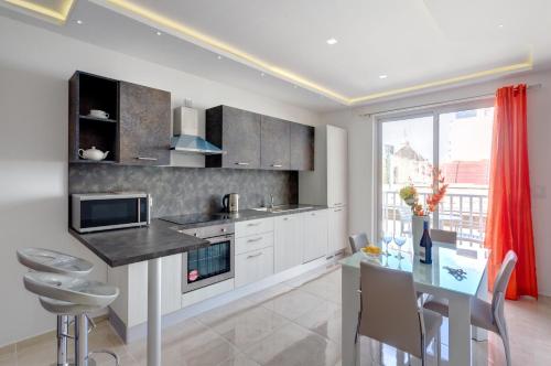 ครัวหรือมุมครัวของ La Rive Apartment