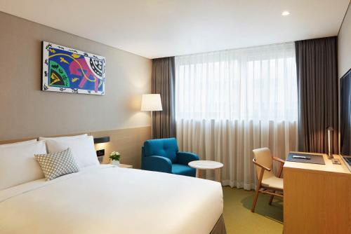 เตียงในห้องที่ Howard Johnson by Wyndham Incheon Airport