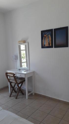 Fotografia z galérie ubytovania Pavlos Rooms v destinácii Livadia