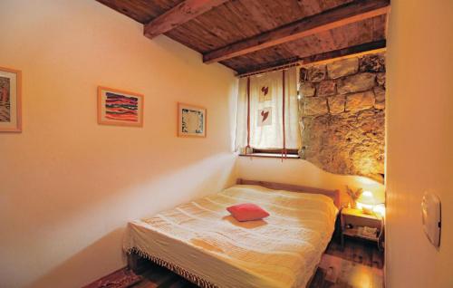 Voodi või voodid majutusasutuse Seaside stone house toas