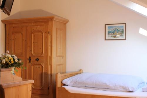 Ένα ή περισσότερα κρεβάτια σε δωμάτιο στο Hotel Haus Kirsch