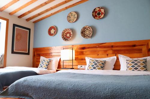 Postel nebo postele na pokoji v ubytování Dali Yunxi Boutique Inn