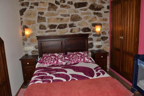 Tempat tidur dalam kamar di La Seronda de Redes