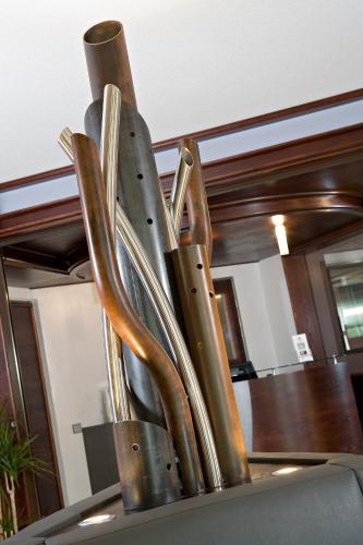 a pile of utensils sitting on top of a counter at Cottage Logis Hôtel - Restaurant in Dudelange