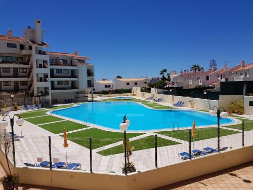 a view of a swimming pool from the balcony of a apartment at Vilamagna Apartment 501 in Albufeira