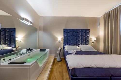 Posteľ alebo postele v izbe v ubytovaní Album Boutique Rooms