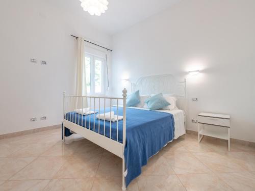 מיטה או מיטות בחדר ב-Casa Lupa Magnifica con Giardino