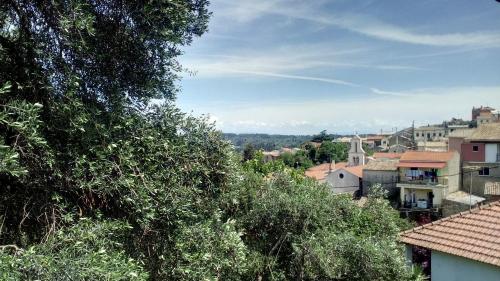 a view of a city with trees and buildings at Village House in Liapades
