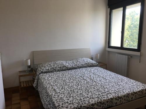 Postel nebo postele na pokoji v ubytování Casa Piave