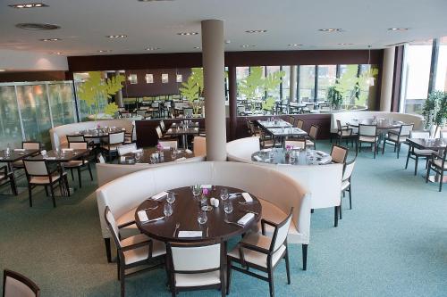 Restaurace v ubytování Hôtel Le Palladior Voiron