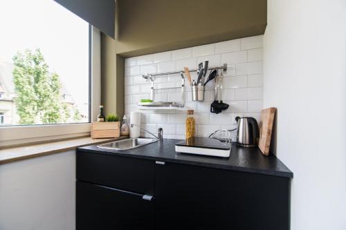 Dapur atau dapur kecil di Apartments KR