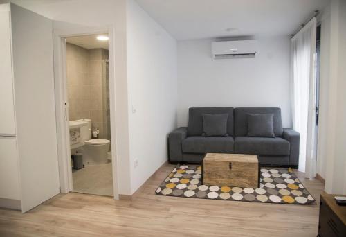 Khu vực ghế ngồi tại Apartamentos Core Suite Sevilla