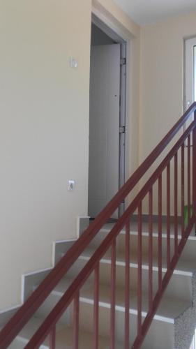 a staircase in a house with a stair case at Apartment Pavlovic in Soko Banja