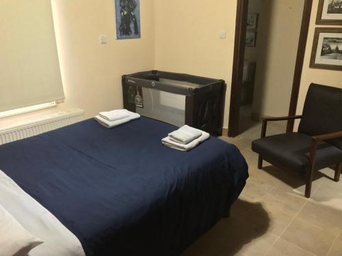 Ένα ή περισσότερα κρεβάτια σε δωμάτιο στο Agia Mavri House