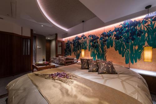 Lova arba lovos apgyvendinimo įstaigoje Hotel Zen Ichinomiya (Adult Only)