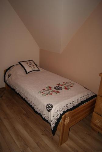 Postel nebo postele na pokoji v ubytování Apartament Góralski