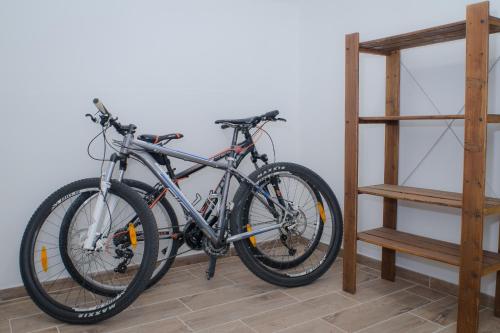 a bike parked in a room next to a ladder at Jüstel apartment in Litoměřice