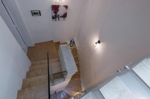 an overhead view of a staircase in a house at Amelie in Rabat