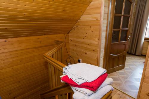 a stack of towels in a sauna at Zolota Rybka in Skhidnitsa