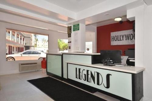 a lobby of a hotel with a reception desk at Legend Hotel Hollywood in Los Angeles