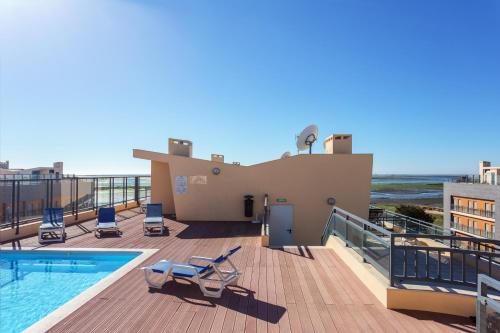 A piscina localizada em Appartement de Charme ou nos arredores