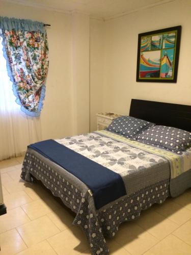 Кровать или кровати в номере Cli´s Place Posada Nativa