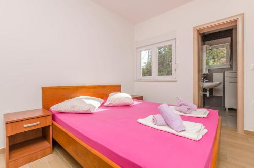 Posteľ alebo postele v izbe v ubytovaní Apartment Ivo