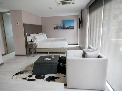 Postel nebo postele na pokoji v ubytování Hotel CityFlats