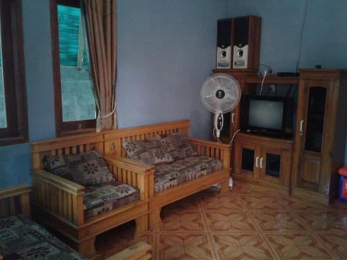 Posezení v ubytování Fajar Home Stay Batukaras