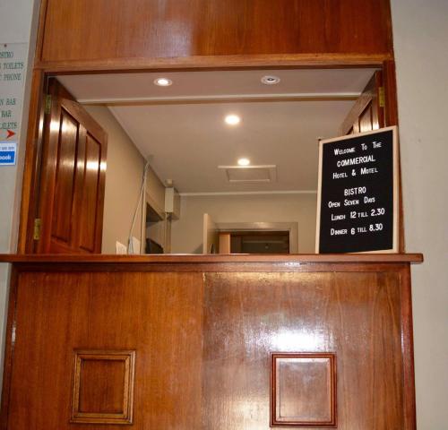 
a sign on a wall in a kitchen at Commercial Hotel Motel Lithgow in Lithgow
