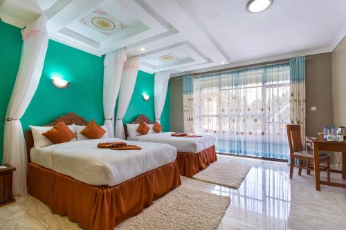 Giường trong phòng chung tại Epashikino Resort & Spa