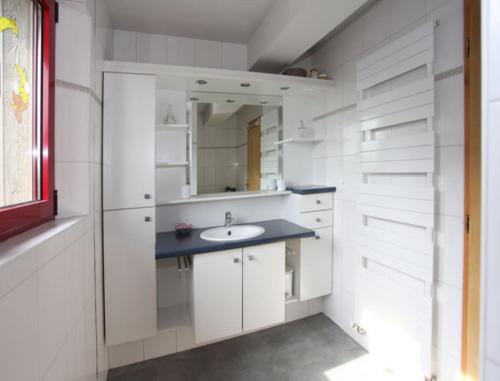 Kuchyň nebo kuchyňský kout v ubytování La maison du Vignoble