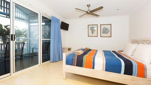 Postel nebo postele na pokoji v ubytování Villa 21 Tangalooma
