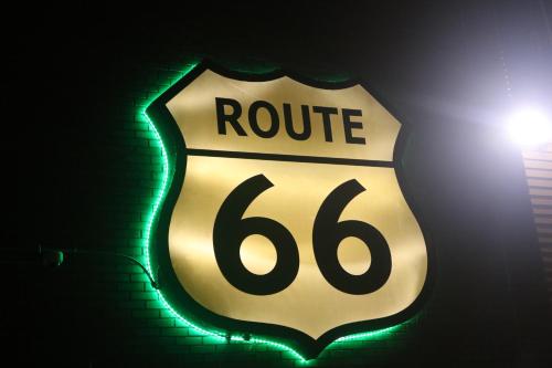 a street sign with a street name on it at Route 66 Hotel, Springfield, Illinois in Springfield