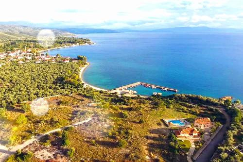 an aerial view of the shoreline of a lake at Kala Nera Panorama in Kala Nera