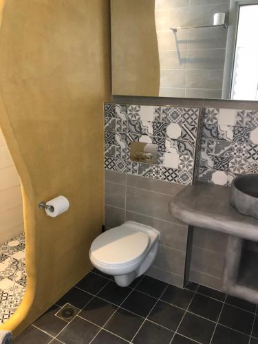 Koupelna v ubytování Afrodete Hotel