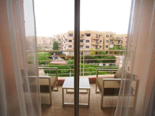 Jnane Gueliz tesisinde bir balkon veya teras
