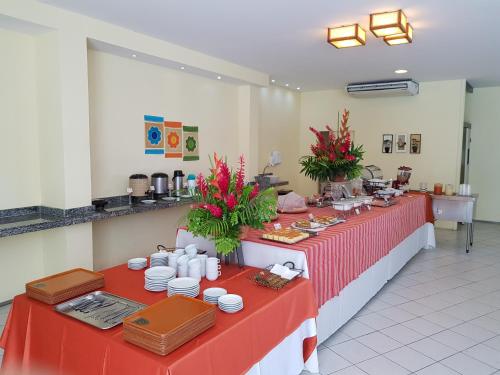 A restaurant or other place to eat at Hotel Recanto Wirapuru