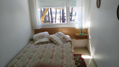 Posteľ alebo postele v izbe v ubytovaní Apartamento San Vicente