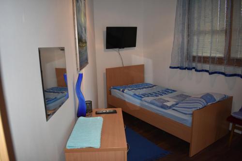 Postel nebo postele na pokoji v ubytování Vila Edu
